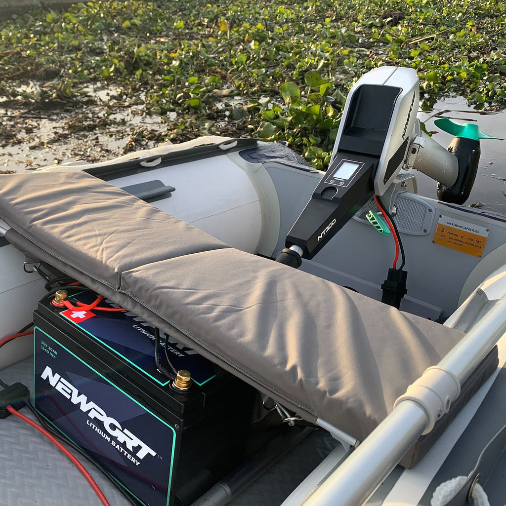 //newportvessels.com/cdn/shop/files/NT300-Motor-36v-30Ah-Lithium-Battery-At-Dock-min_1024x.progressive