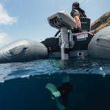 Newport NS130 Inflatable boat with a NT600 Outboard motor in the water